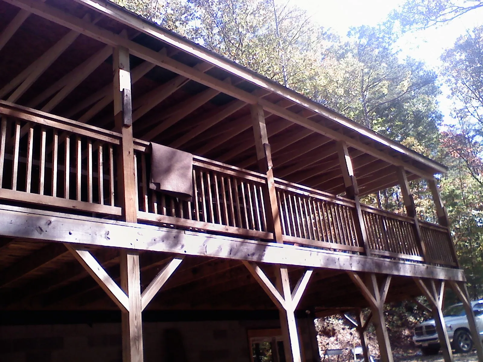 Timber framing under a new elevated porch and deck — Roof Leak Repair in Gilby by Roofing Brothers